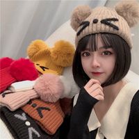 Wholesale autumn and winter thickened Wool Hat Women s Designer version versatile cute ear protection double hair ball knitted