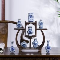 Wholesale Jingdezhen pure handmade Chinese style living room tea table antique blue and white porcelain mini flower arrangement small vase