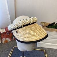 Wholesale Pure handmade net red pearl empty top hat wheat straw chain hairpin Hat Women s summer sun visor Beach Hat Zy