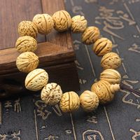 Wholesale 15mm natural hickory hand string peach beard natural hand polished small walnut bracelet is popular in the scenic spot