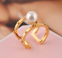 Wholesale White pearl copper plating gold rivet opening double hollow marking ring women go with everything QPSX