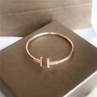 Wholesale Double diamond T open copper magnetic classic bangle charm bracelet designs with female temperament and simple tiktok gemstone nail jewelry