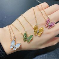 Wholesale Fanjia has K Gold Plated Pink yellow diamond Green Diamond Necklace White Shell Butterfly Pendant