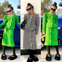 Wholesale Big girls diamond lattice quilted clothes sets kids V neck puff sleeve tops single breasted skirt lady style children black white plaid outfits Q3889