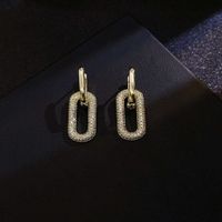 Wholesale hoop style temperament geometric ellipse earrings net red and smart simple full diamond Tremella nails