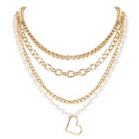 Wholesale Designer Golden Alloy Peach Heart Pendant Necklaces Pearl Bead Ethnic Style Personality Mix and Match Clavicle Chain Multilayer Snake Chain Necklace Party Jewelry