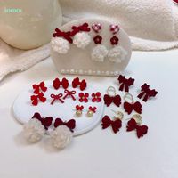 Wholesale Stud Xxixx Winter Style Women s Earrings Bow knot Red Pompon Wedding Fashion Jewelry Sweet Girl Party Gift Ear Decoration X