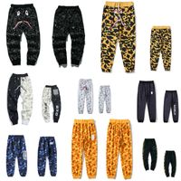 Wholesale Apes men s pants high quality Japanese shark head color graffiti stitching beam feet male and female couple personality trend hip hop casual trousers