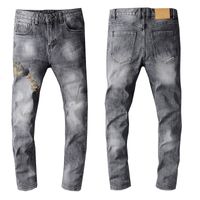 Wholesale Latest Listing Design Winter Mens Jeans Blue Good Quality Designer Spray Paint Spliced Ripped High Street Destroyed Denim Trousers US Size W28 W40