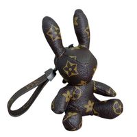 Wholesale 16CM Retro flower lovely leather rabbit key ring car key chain holders bag purses handbag pendant with lanyard bracelet wristband charms easter day gift GW4VUBT