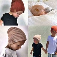 Wholesale 2 Years Old KIDS Beanie Hat Boys Girls Slouch Winter Woolly Ski Childrens Turn Up Neon Warm Leather Label knitted Baby Wool Beanies Solid Skull Caps NEW G00SXCO