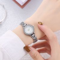 Wholesale 2021 Small Gold Watch Simple Ladies Delicate Small Dial Light Luxury Watch Female shell dial full diamond