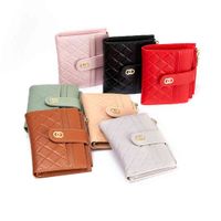 Wholesale 2021 new wallet women s folding multi card position simple belt buckle small fresh short bag zero