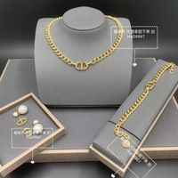 Wholesale High quality fashion jewelry letter necklace female family Bracelet hand string brass earrings pearl Tassel Earrings