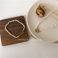 Wholesale New Design Feeling Small Flower Clavicle Chain Ins Cool Wind Rice Grain Bracelet Special Shaped Freshwater Pearl Necklace Choker