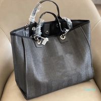Wholesale high quality Brand design Ladies shoulder Cross body bag Fashionable large capacity woven canvas handbag with leather chain shopping beach