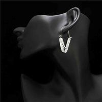 Wholesale custom trendy korean unique hook geometric statement novelty brass drop jewelry v shaped copper pendant earring women