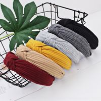Wholesale ls2 yiwu south korean accessories grottoes south korean solid color eads hair band wide edge cloth hairband women s hand cross knot hook