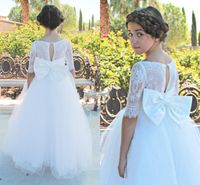 Wholesale lace tulle flower girls dress bateau short sleeves floor length backless bow simple first cummunion dress brithday party skirt