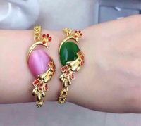 Wholesale China Wind Peacock Opal k gold plated copper bracelet filled with Christmas gifts