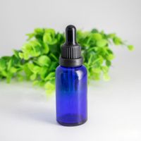 Wholesale 1OZ ml Clear Blue Green Amber Glass Dropper Bottles with Dripper Cap and Glass Tip