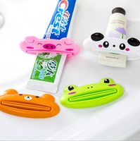 Wholesale new bathroom accessories cute cartoons animals multifunctional toothpaste squeezer toothpaste tube rolling holder tools dispenser free shipp