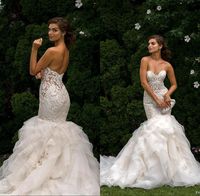 Wholesale 2020 African Lace Appliques Wedding Dresses Sweetheart Mermaid Sheer Backless Tired Skirts Ruffles Plus Size Bridal Gowns