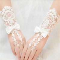 Wholesale 2017 New Short Bridal Gloves with Bow Free Size Romantic Wedding Gloves for Wedding Dress Elegant White Ivory Princess Wedding Accessories