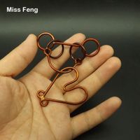 Wholesale Collection Hand Made Metal Red Copper Heart Ring Puzzle Toy Solution Game Birthday Gift Intelligence Game
