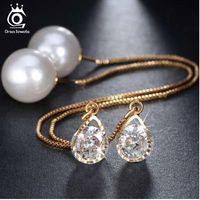 Wholesale ORSA JEWELS New Water Drop Shape Austrian Crystal Long Stud Earrings with big Pearl Elegant Gold color Jewelry for Women OME27