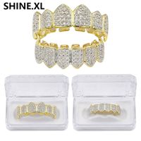 Wholesale VampireNew Design Hip Hop Teeth Grillz Gold Plated iCED OUT Zircon Canine Tooth Cap Top Bottom Grills Vampire Set