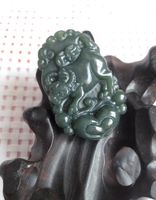 Wholesale China s xinjiang hetian jade the mythical wild animal pendant with A3