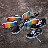 black vans with rainbow bottom