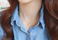 Wholesale Korea match adorn article female han edition fashionable and simple temperament pearl shell modelling pendant short collarbone