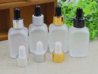 Wholesale square frosted clear glass bottle ml ml ml matte clear dropper bottle gold cape for cosmetic essential oil perfume vape e liquid