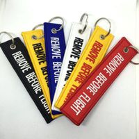 Wholesale 6 Colors Polyester Fabric REMOVE BEFORE FLIGHT Embroidery Aviation Flight Words Key Chain Originality Gift Keychains KKA1419