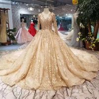 Wholesale Golden Lace Wedding Dresses Newest Style Champagne V Neck Long Sleeves Lace Up Back Party Wedding Dress With Shiny Royal Train