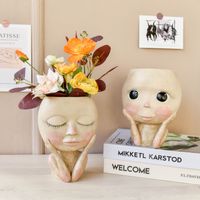 Wholesale Creative ceramic vase man face cute man portrait tabletop flower vase beige figure planter sculpture kids gift