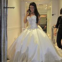 Wholesale Ivory Bling Pnina Tornai Wedding Dresses Sweetheart Ball Gowns Sparkly Crystal Backless Long Train Bridal Gowns Cheap