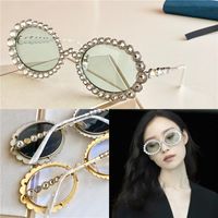 Wholesale women design sunglasses inlaid with sparkling crystal diamond small oval frame top quality UV400 glasses fashion sunglasses