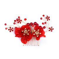 red flower hair accessories uk