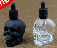Wholesale vape e juice glass bottles ml skull head dropper bottle matte frosted black and clear color ml ml e liquid skull bottle