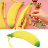 Wholesale Ulrica Novelty Funny Silicone Portable Yellow Banana Coin Pencil Case Unique Purse Bag Wallet Pouch Keyring Hot Selling