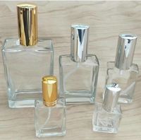 Wholesale 50ml clear rectangular perfume glass spray bottle flat square with gold silver black spray top custom
