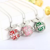 Wholesale New Hollow Angel Wings Flower Pattern Locket Pendant Necklaces Essential Oil Diffuser Necklace Aromatherapy Balls Adjustable Chain