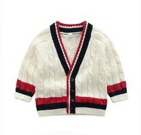 maglione bianco bambino