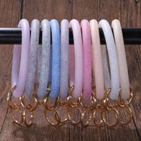 Wholesale New trendy fashion ins designer cute lovely diamond glittering leather Fluorescence rubber convenient keychain bangle bracelet for woman