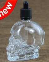 Wholesale new Product ml electronic cigarettes vape juice clear skull bottle glass empty e liquid essential oil glass bottles ml