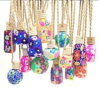 Wholesale 10ml ml Polymer Clay Ceramic essential oil bottle Car hanging decoration Car Home Hanging rope empty Perfume bottle Wooden Lid Gift