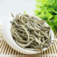 Wholesale 100g Raw Puer Tea Yunnan Silver Needle Loose White Puer Tea Organic Pu er Old Tree Green Puer Natural Puerh Tea Factory Direct Sales